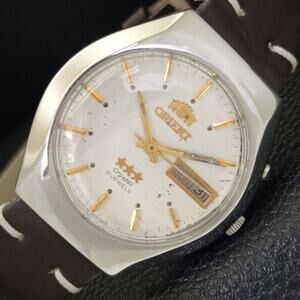 Vintage 1978 Orient Automatic Mens Silver Watch W/daydate & Gold accents